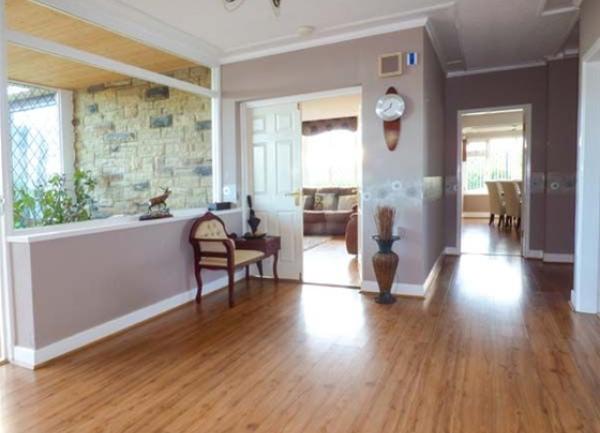 The pine-floored entrance hall in Seacrest Lodge.