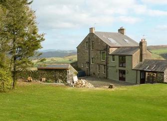 3-storey stone-built Cumbrian farmhouse in a remote rural location