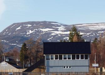 Exterior of a Newtonmore holiday cottage in a restored railway signal box.