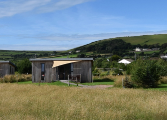 A wooden holiday lodge in the North Devon countryside near Braunton