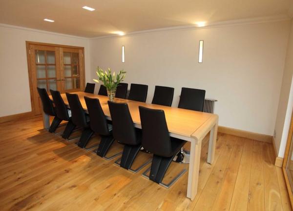 Dining table with 12 chairs.