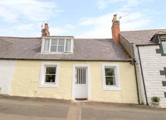 Single. storey terrraced holiday cottage with a dormer bedroom window in Berwickshire