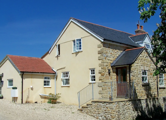 2-storey exterior of a stone-built, large Dorset holiday cottage