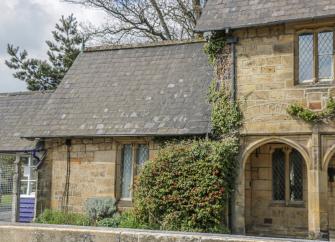 Exterior of a heritage railway station building in North Yorkshire.