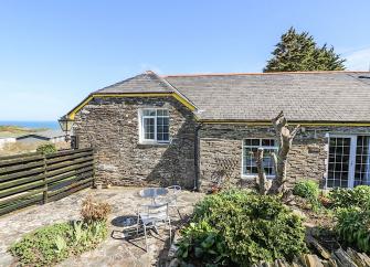 A single storey Tintagel Garden Apartment overlooks a large rockery.