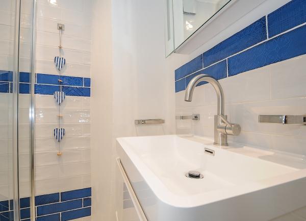 A bathroom corner with a large basin.