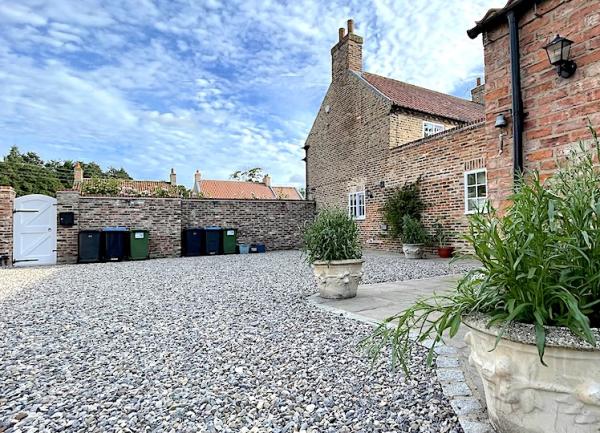 The courtyard with gravel drive