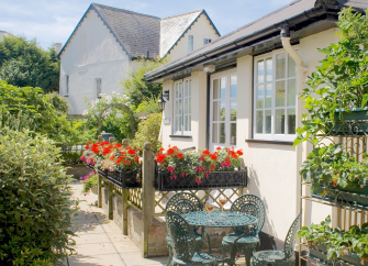 Exterior of a Regency cottage and garden in Sidmouth