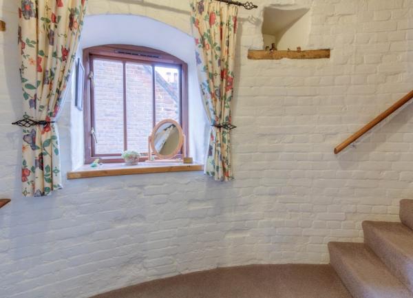 A small landing between stairs in a Norfolk windmill.