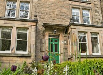 Exterior and front garden of a 3-storey Georgian town house.