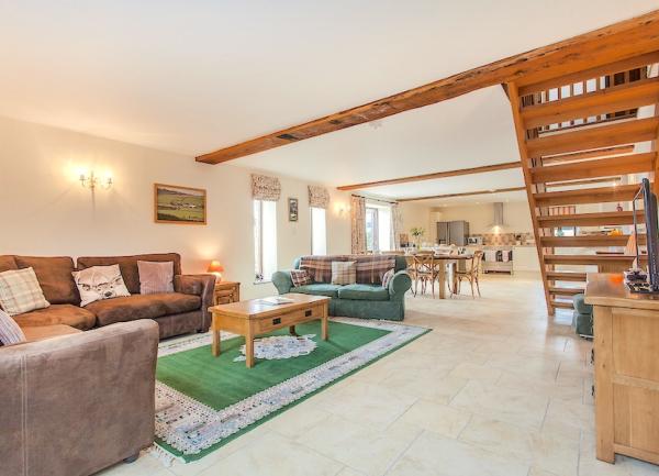 https://www.myfavouriteholidaycottages.co.uk/sites/default/files/cottage/2024-05-03/2.the-old-stables-at-mornacott.south-molton-holiday-cottages.open-plan-living-area_1.jpg