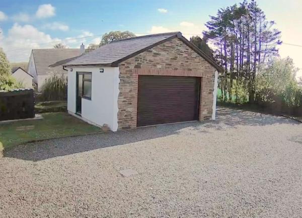 Garage and off-road parking spaces.