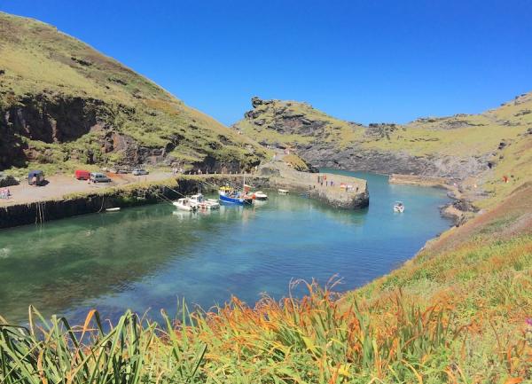 Boscastle Harbour, a long narrow valley with Quayside and harbour wall.