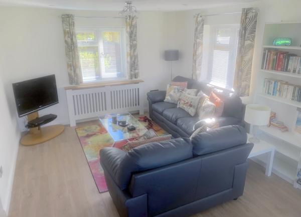 Lounge with sofas and tv