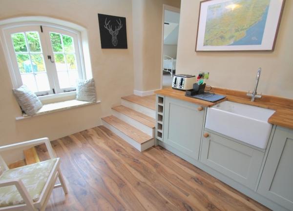 Kiitchen with sink, toaster, armchair 