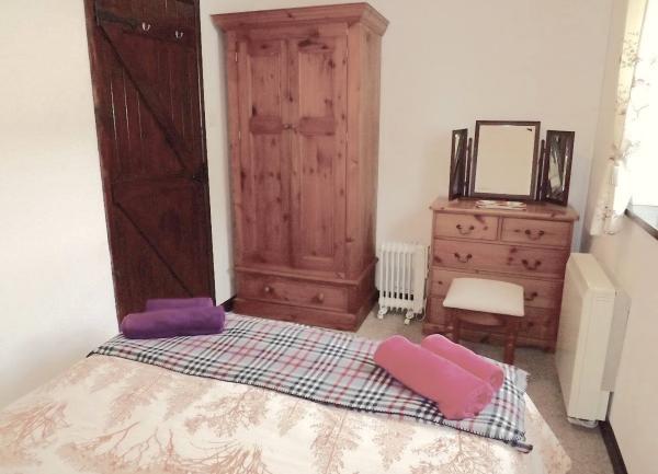 Double bedroom with wardrobe and dressing table