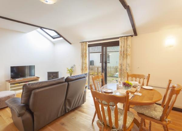 Lounge-diner with French Windows leading to garden.