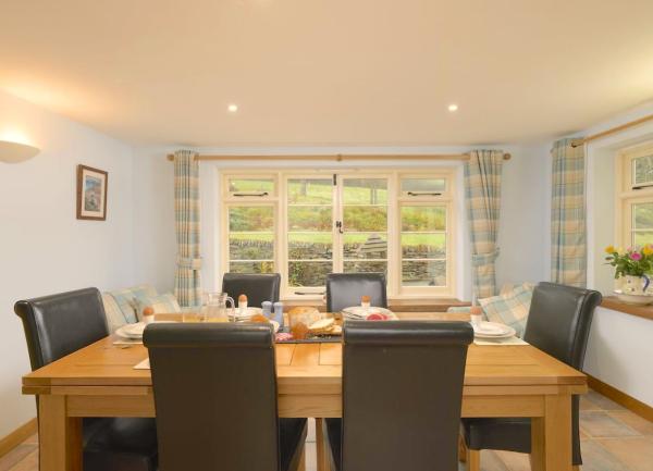 Dining room with table and 6 dining chairs.