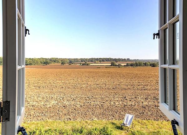 Rural view from an open window.