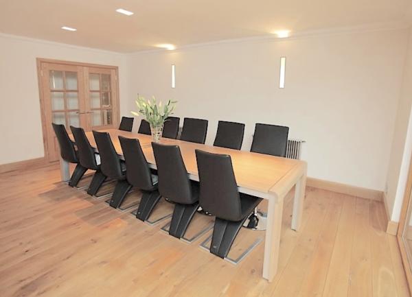 Dining area with table and chairs for 12.