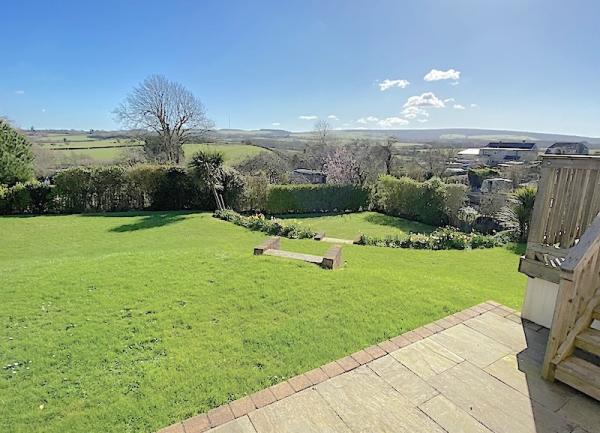Garden patio and lawn with far-reaching views.