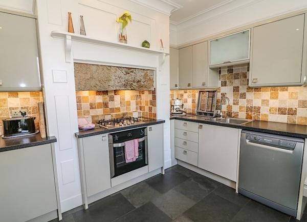 Fitted kitchen with integrated appliances.