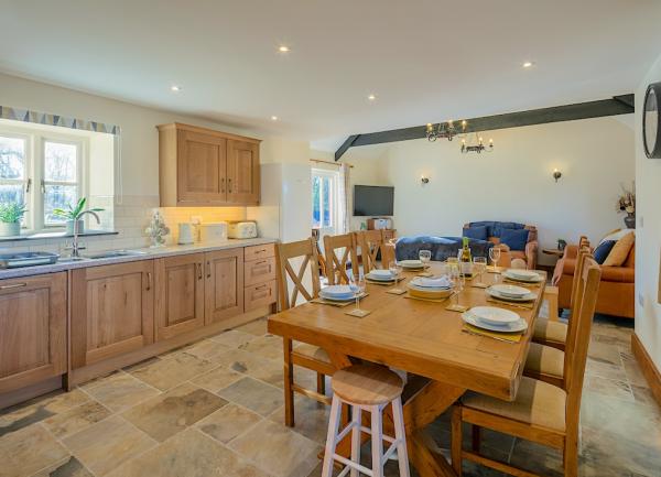 Kitchen, dining and loiunge areas.