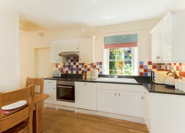 Fitted units and worktop appliances in a Somerset holiday cottage kitchen.