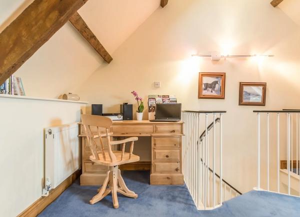 A handy desk space for checking emails and writing postcards.