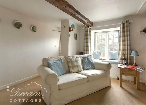 Lounge with sofa and side table.