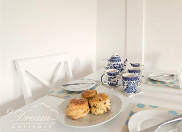 Dorset cream tea on a dining room table.
