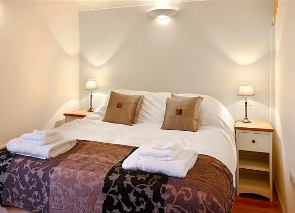 Large double bed with twin towel sets.