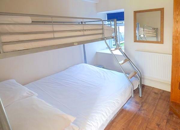 Bunk beds with a double single bed.