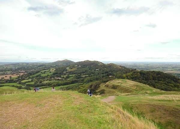 A footpath snakes across a ridge in the Malvern Hills