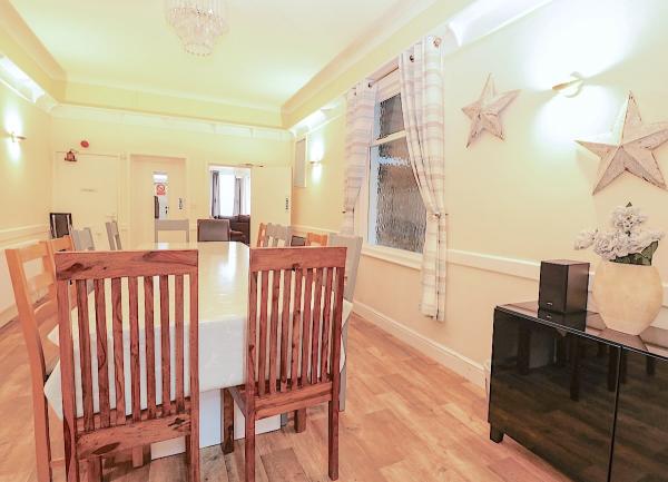 Dining room with a 12-seat wooden table