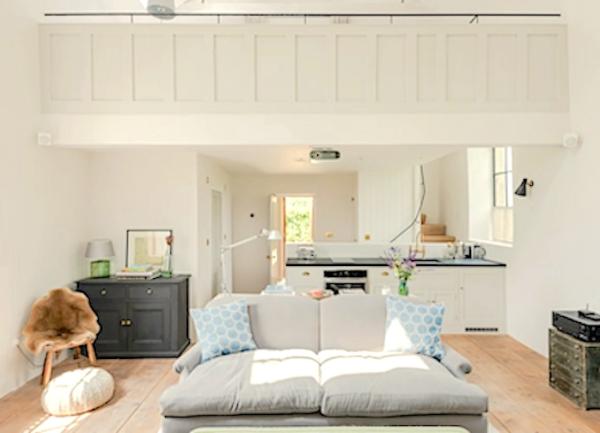 Open plan living area with lounge and fitted kitchen-diner