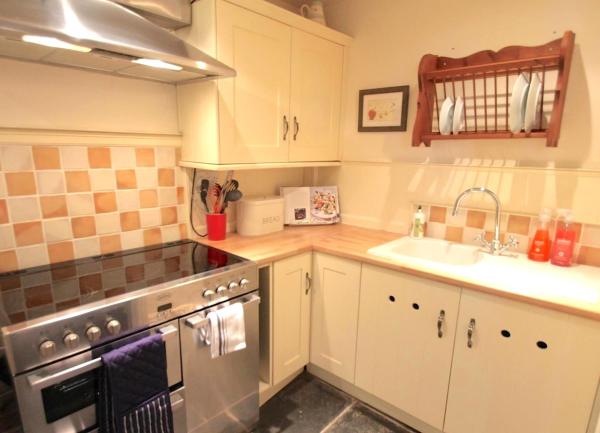 An Exmoor cottage kitchen with a modern range cooker.
