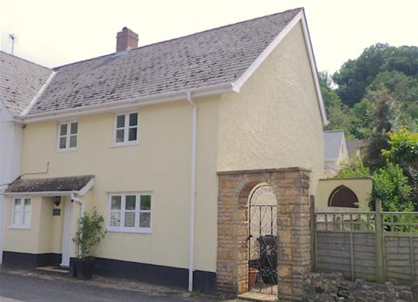 Exterior of a 2-storey holiday cottage in Axmouth.