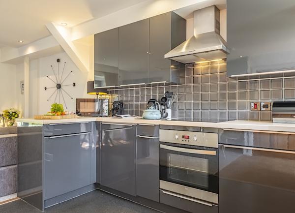 A bespoke fitted, well-equipped kitchen in a Norfolk cottage.