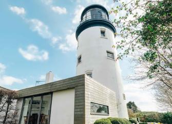 Exterior of a Norfolk lighthouse converted to a luxury holiday home.