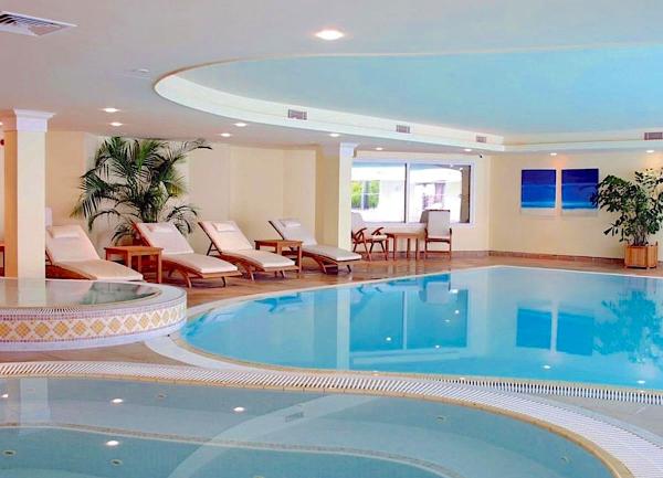 An indoor heated swiming pool, hot tub and sun loungers..