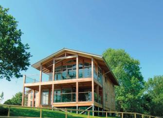A 3-storey, wood and glass holiday home in a rural location.