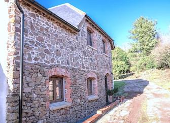 2-storey, stone-built holiday lodge in a rural location.