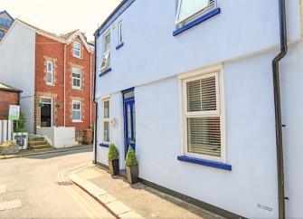 A neatly presented, double-fronted cottage on a quiet road corner in Dartmouth.