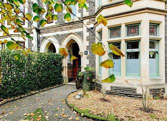 Bay windowed ground floor exterior of a Victorian townhouse