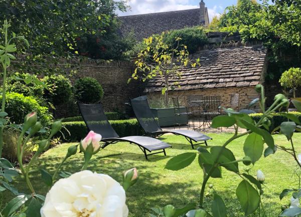 Garden loungers in a country garden.