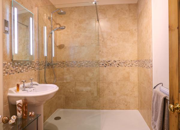 Large walk in monsoon shower bathroom