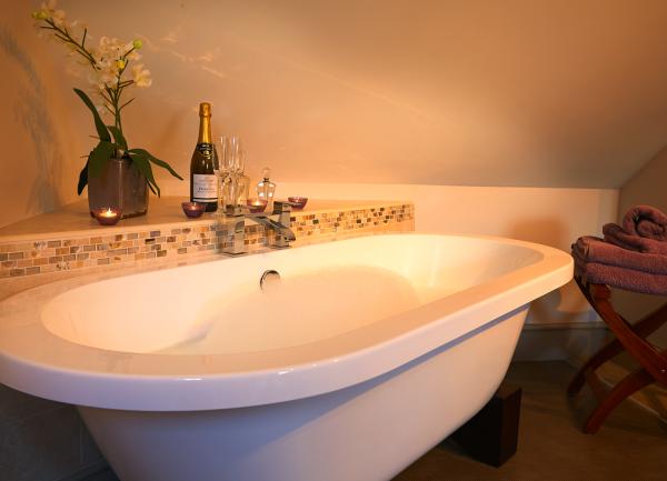 Roll top bath in main bedroom