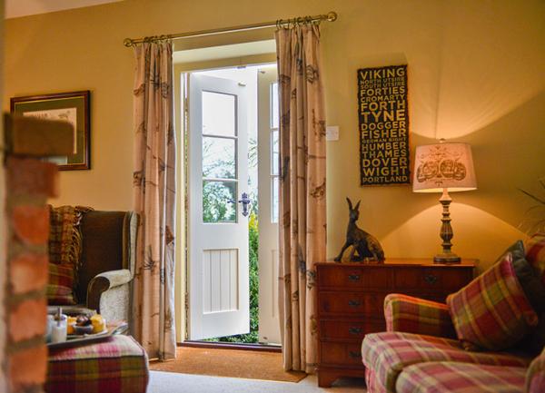 French doors open out onto a private patio