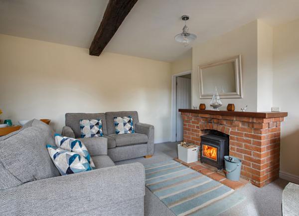 Stable End Cottage holiday in Weybourne, Norfolk lounge.